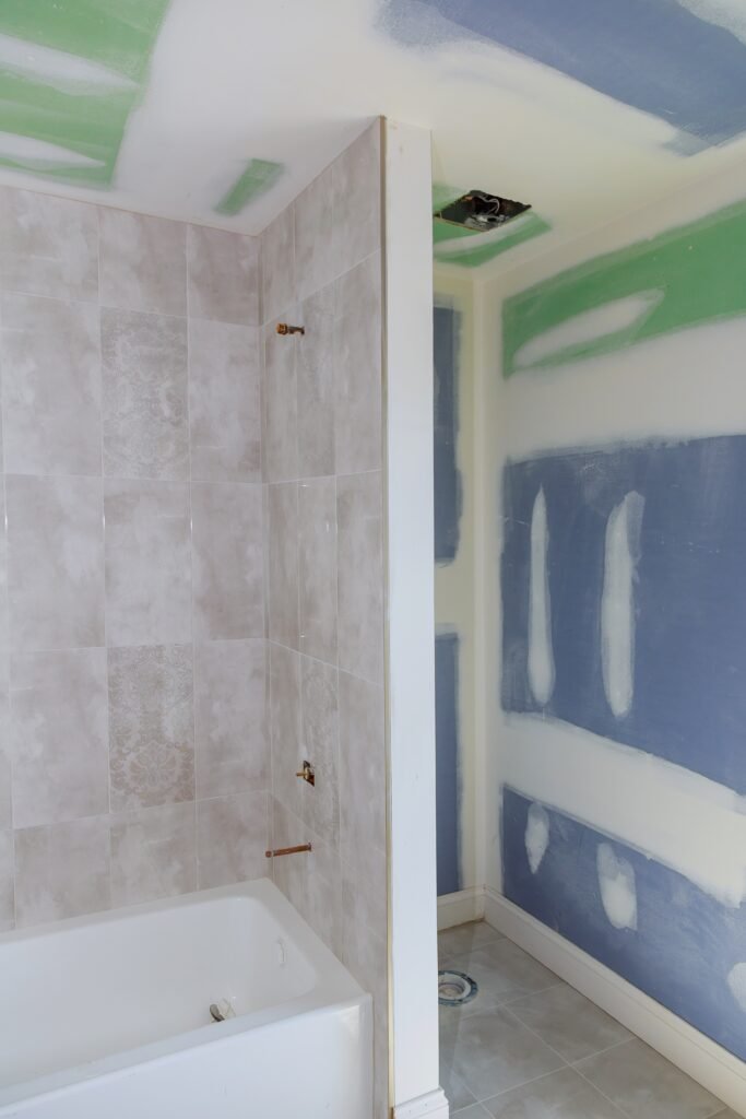 renovation-of-a-bathroom-bathroom-with-new-under-construction-bathro-surrey bathroom renovations surrey old to new general contracting surrey waterproofing bathroom